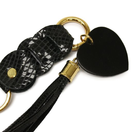 Táskadísz és kulcstartó fekete bőrből, arany kellékekkel